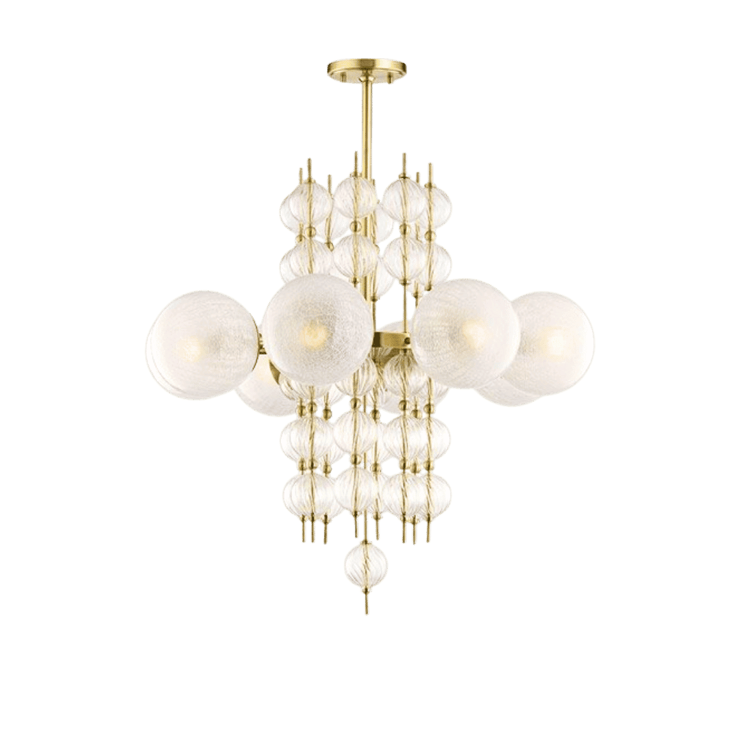 The Calypso 8-Light Chandelier featuring a luxurious gold finish, beautifully displayed in a modern living space, enhancing the decor with its warm and inviting glow