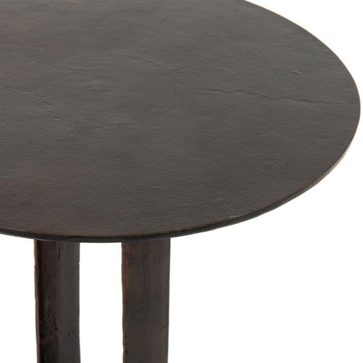 a closed image of small black iron table  