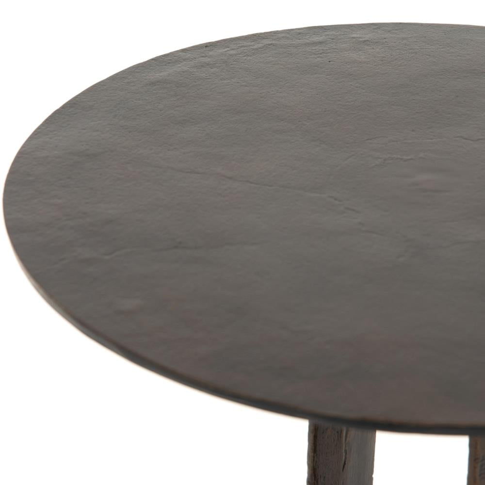 A closed image of small black iron table 